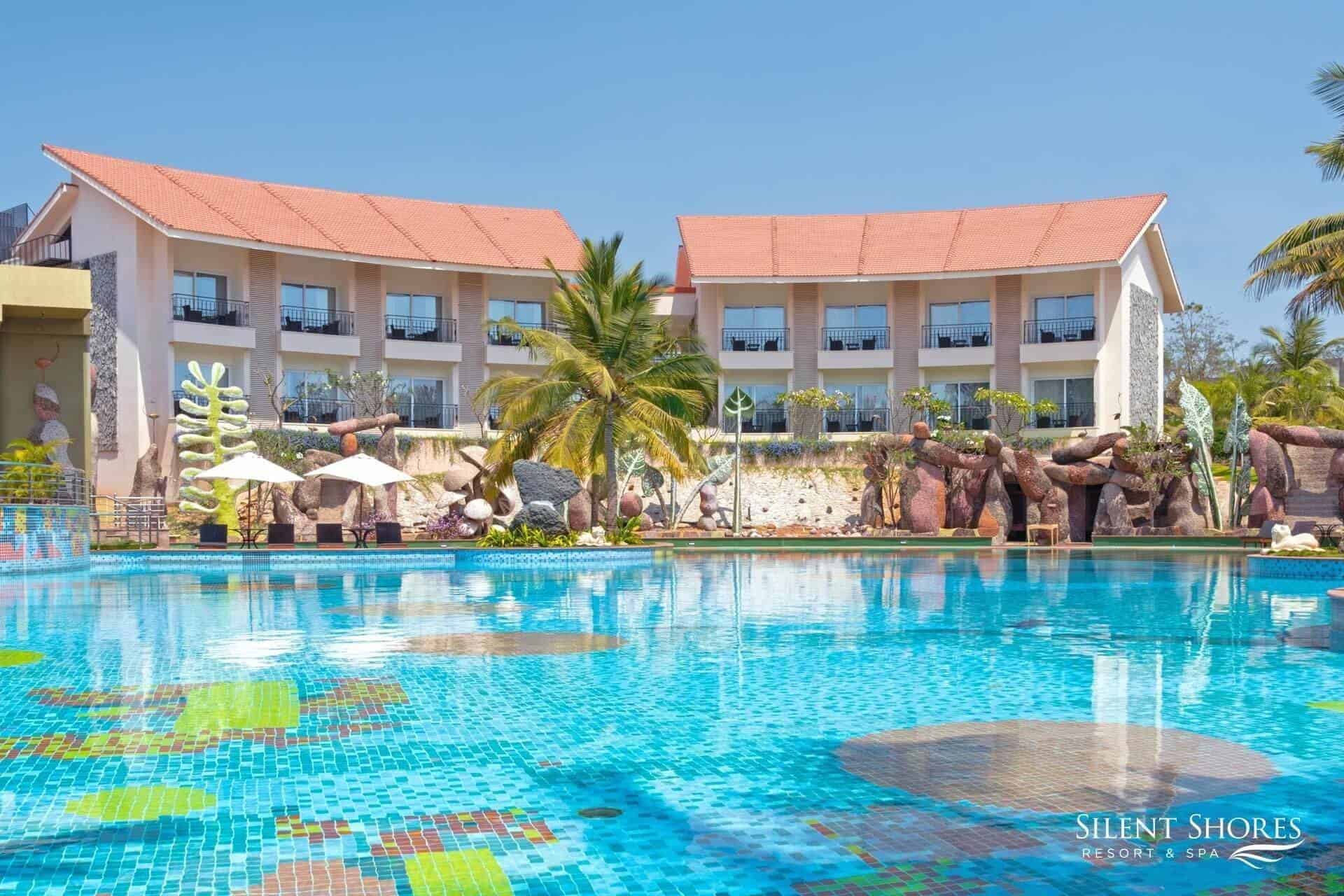 Swimming pool overlooking Superior rooms in Mysore, Silent Shores - The best spa resort in Mysore - resort in Mysore